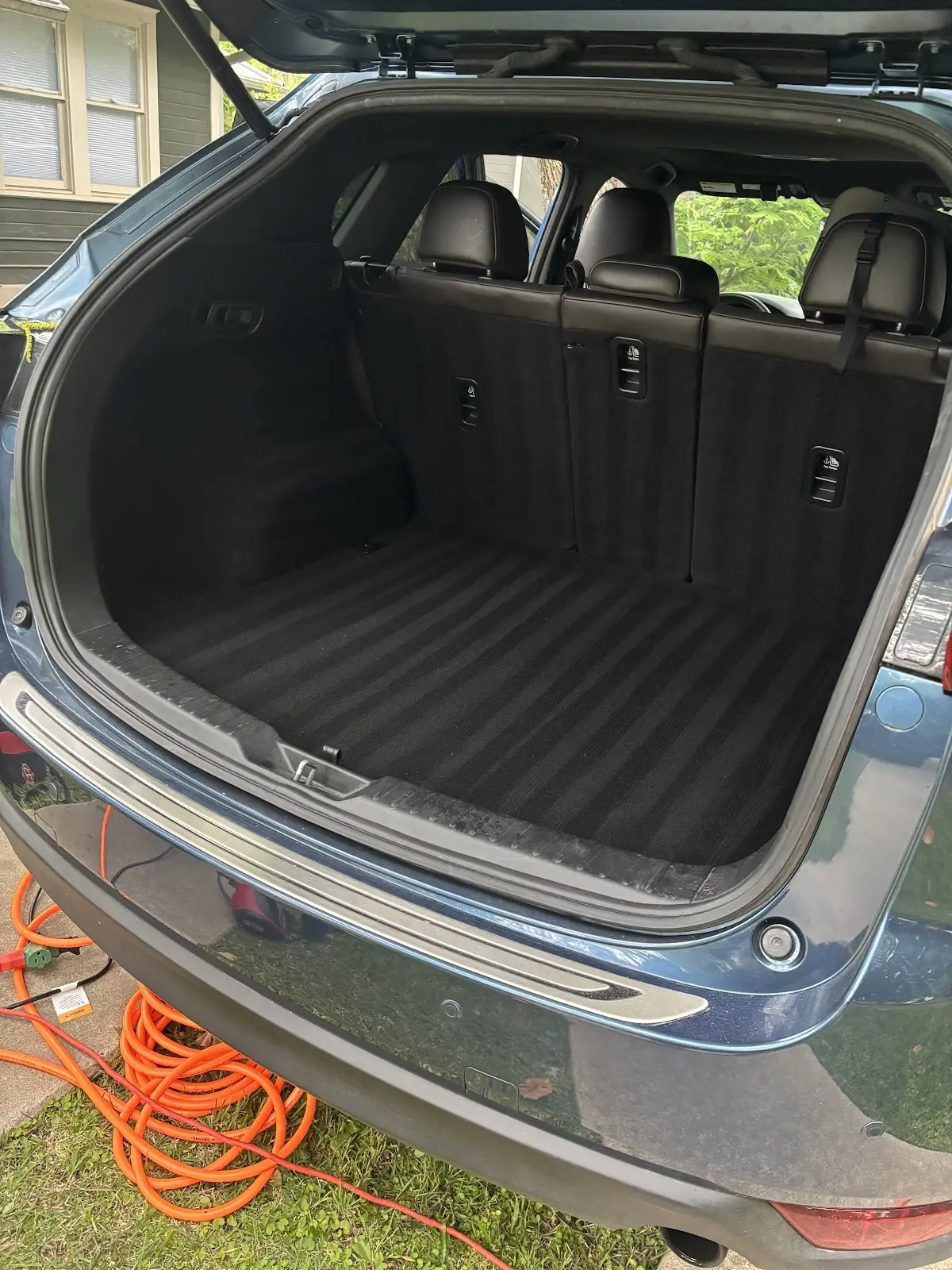 Cleaned SUV cargo area with the rear hatch open